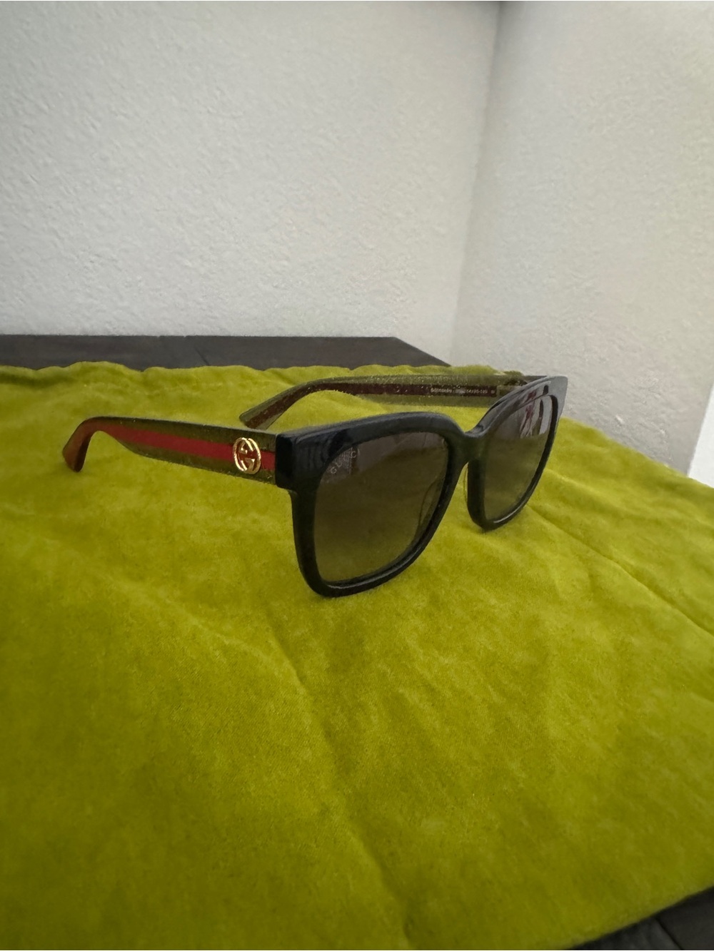Gucci Black Frame Sunglasses with Red Temple Stripe and Gold Logo